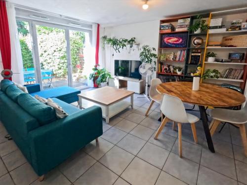 Duplex avec jardin au calme
