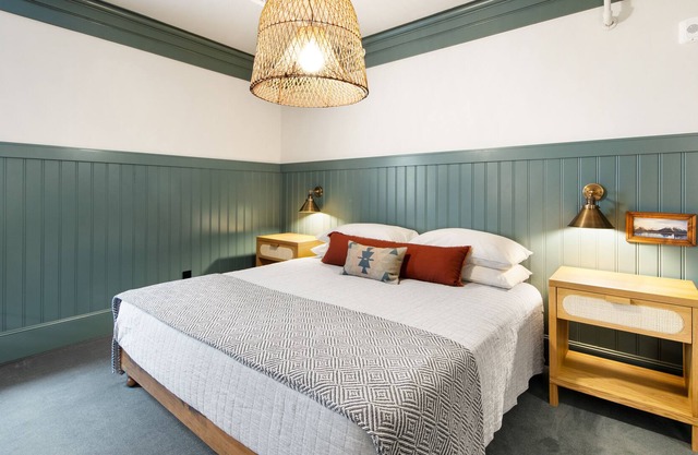 Elegant room at Historic Hotel Scandi with sofabed, kitchenette, & city views
