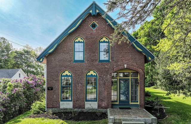 Elegant Victorian Gothic Revival home with wet bar, sunroom, & washer/dryer