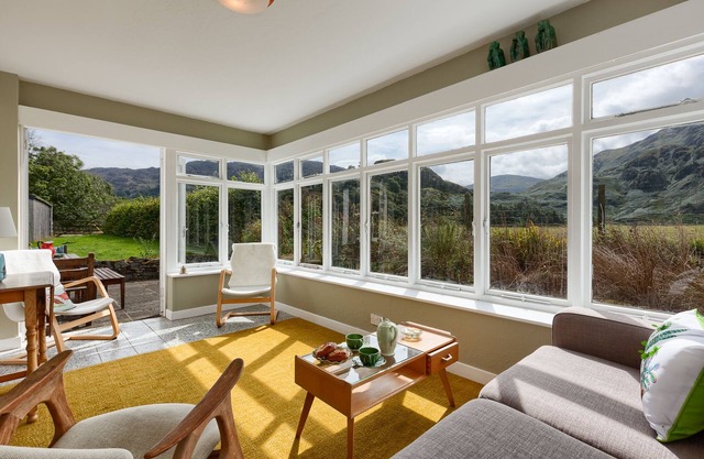 Enchanting, rustic cottage w/superb views and private river.