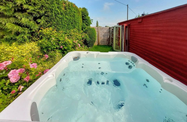 Enjoy an unforgettable time in this idyllically located vacation home with outdoor hot tub.