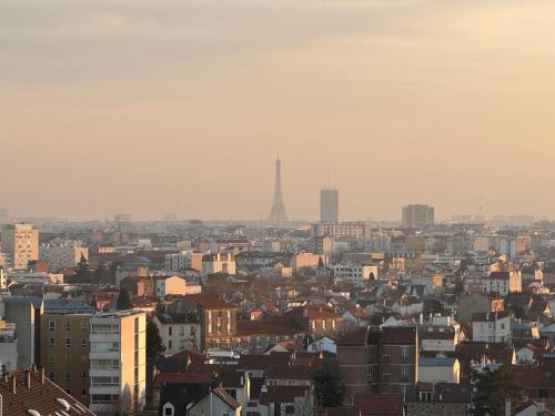 Enjoy Eiffel Tower Views from Our Home, just 20 Minutes to Paris Center