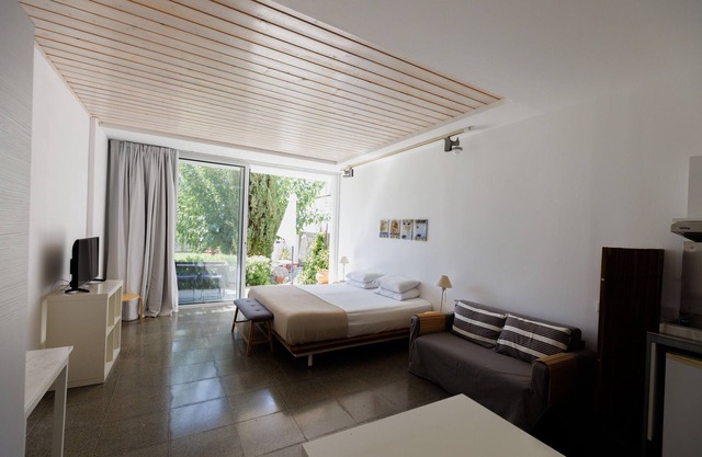 Eupnea | Studio Apartment, Art by PraXis Apartments