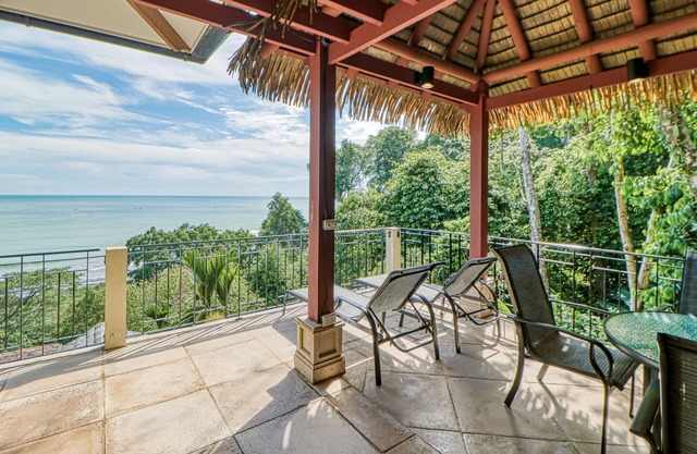 Exceptional Dog-Friendly Treetop Condo with Ocean Views & Breezy Balcony