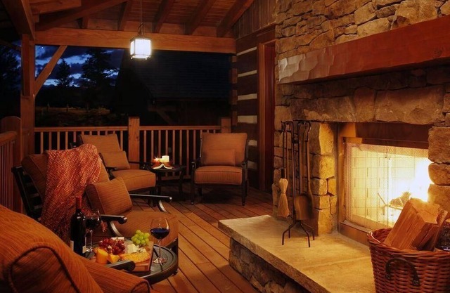 Expansive porch with outdoor fireplace! Rec room inc pool and snooker tables