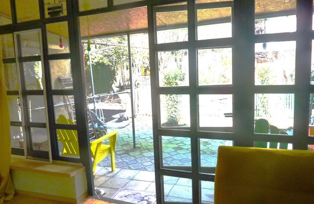 Experience tranquility in the center of the city. Enjoy a private garden.n