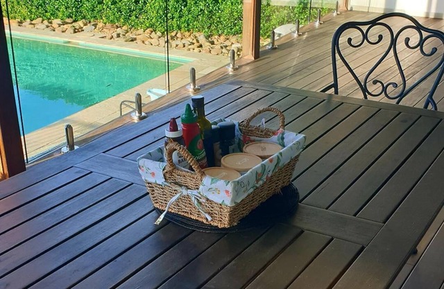 EXPLORE the beauty of nearby beaches , RELAX by the resort style pool, REPEAT.
