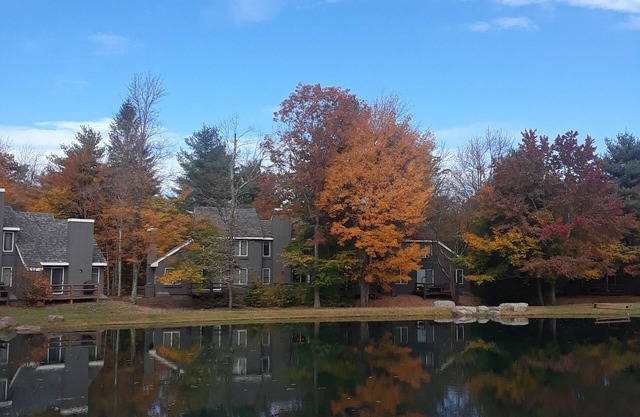Fall fun, Autumn foliage in Lake Harmony at Jack Frost Mtn with scenic Pond View