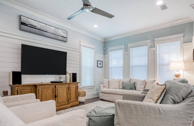 Family-friendly home with screened-In lanai, shared pool, and beach access