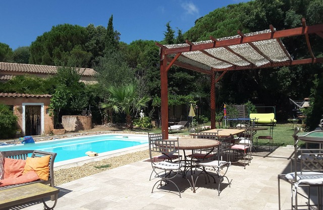Family home with pool in a green setting