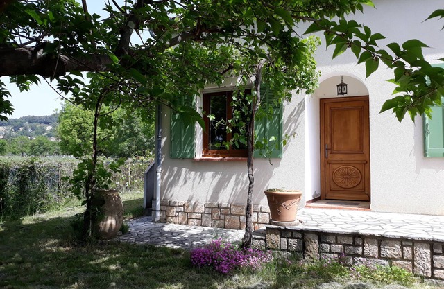 Family home with garden and village views