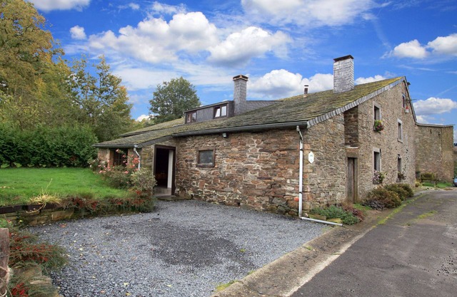Farmhouse situated at the edge of the woods