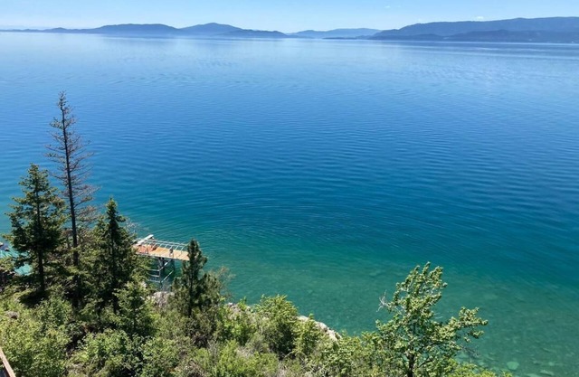 Fill your soul w/400' of PRIVATE waterfront w/dock, lift, diving board & more!