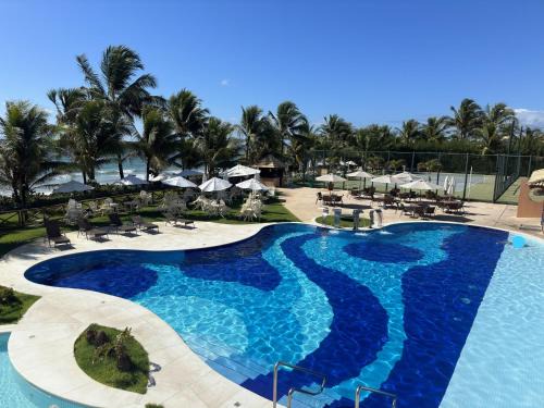 Flat Guarajuba - 3 quartos 2 andar à Beira Mar - pé areia - governança com arrumadeira e Wi Fi inclusos