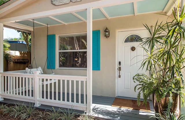 Florida bungalow with loads of charm in tropical and private setting.