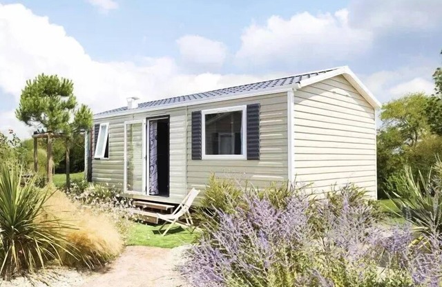 Flower Camping Saint Lambert * - Mobile home Modulo Comfort 30m2 2 bedrooms - Terrace semi-covered + TV 6 persons