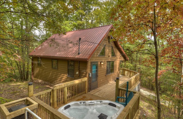 Fox Den Cabin is the perfect mountain cabin that sleeps 4 w/ hot tub & fire pit.