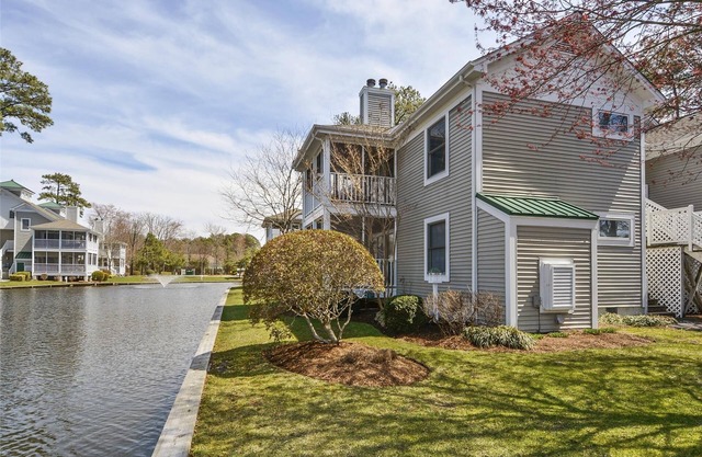Free Golf at Bear Trap Dunes and MORE! 2 Bedroom 2 bath. first floor Sea Colony West unit with a beautiful view of the lake.