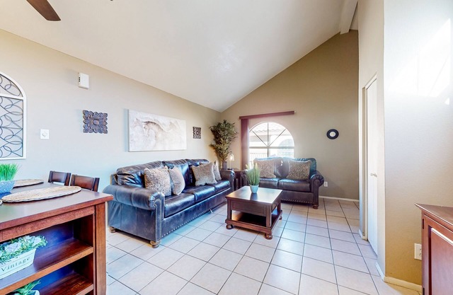 Gated-entry condo with central location, central AC, & private W/D