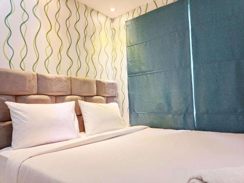 Good Deal and Comfy 1BR Vida View Apartment By Travelio