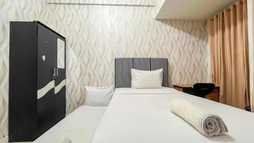 Good Place Studio Apartment at Vida View Makassar By Travelio