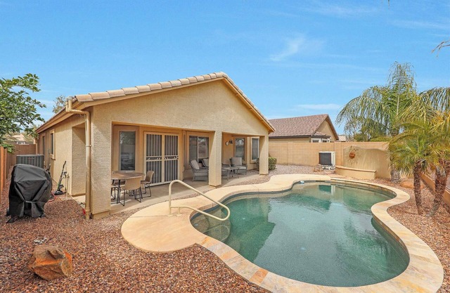 Gorgeous 4 bedroom, 2 bath house with a HEATED pool, hole 6 !