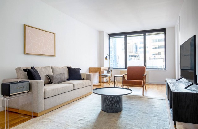 Gorgeous Sutton Place 2BR w/Gym, near Central Park, by Blueground