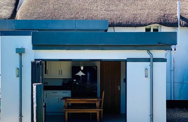 Grade II Listed Modernised Thatched Cottage