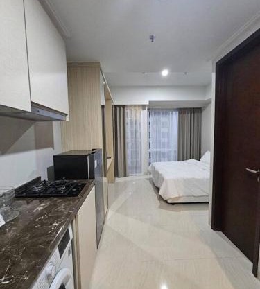 Green Sedayu Apartment Suite by Ellison