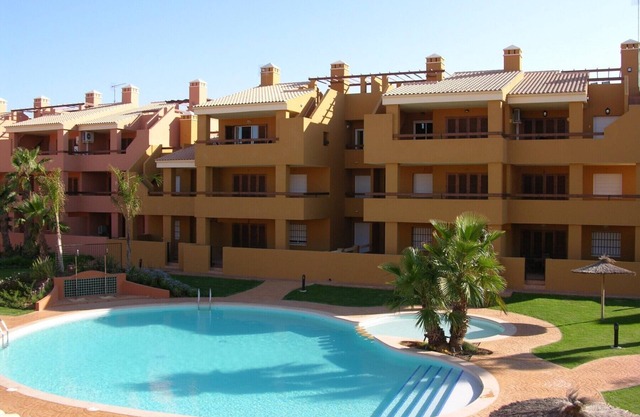 Ground floor apartment, free wifi, patio, pool view