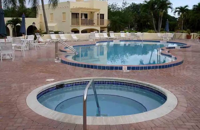 Ground Floor Condo in the Prestigious World Tennis Club, Membership Included