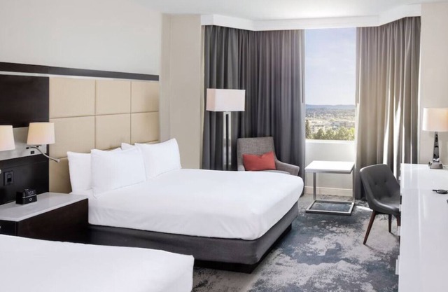 Group Getaway! Two Relaxing Units, Central and Pet-friendly Hotel with Pool!