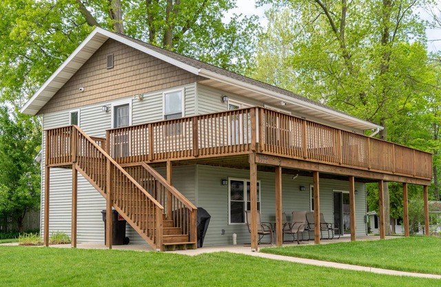 Gun Lake home w/private lot, dock, and tons of parking!