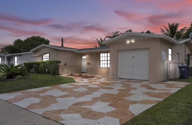 HIDDEN GEM! Spacious 4BR/2B Home W/Pool and Garage