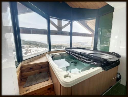 High standing chalet/SPA overlooking the valley