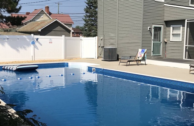 Historic, Spacious, 4 BR, POOL, dog friendly home in town with a gas fire pit .