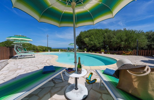 Holiday Apartment "Casa Ginepro Piscina E Vista Mare" with Sea View, Shared Pool & Wi-Fi