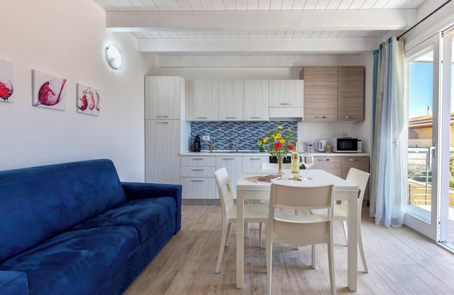 Holiday Apartment “Sa Domo Mea Isola Rossa” with Sea View and Air Conditioning