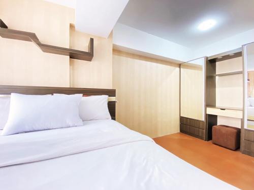 Homey 1BR at Jarrdin Cihampelas Apartment By Travelio