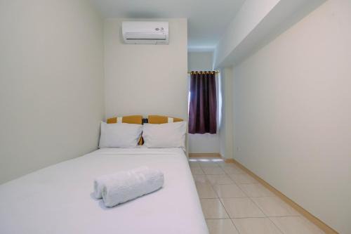 Homey 2BR Apartment at Springlake Summarecon Bekasi By Travelio