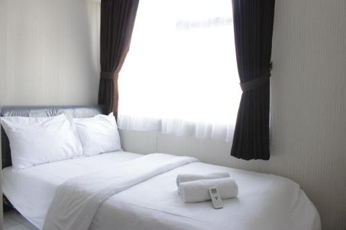 Homey 2BR Apartment at The Jarrdin Cihampelas By Travelio