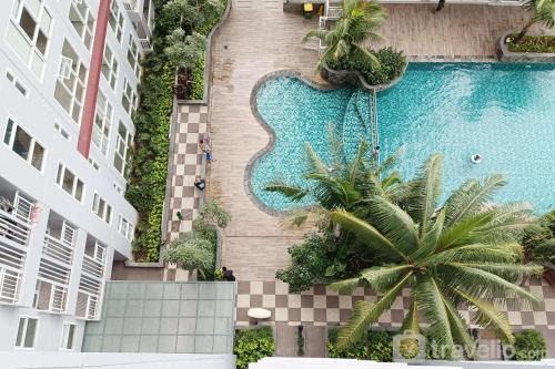Homey and Tidy Studio Apartment at Vida View Makassar By Travelio