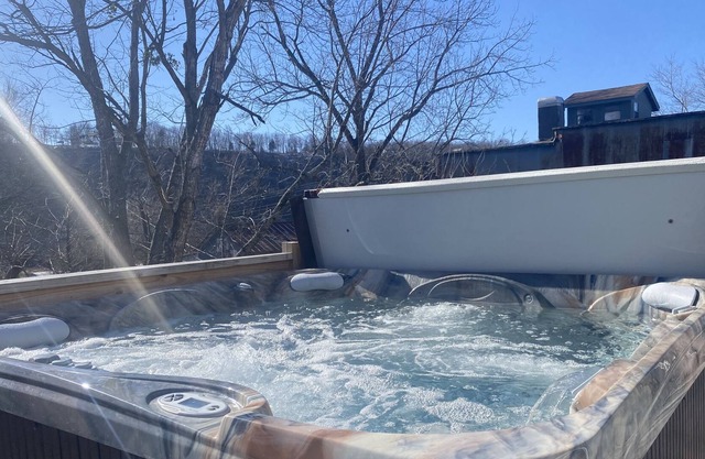 HOT TUB!! Beautifully renovated property with large private HOT TUB!!
