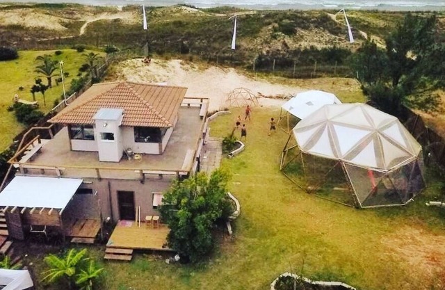 House foot in the sand in Barra da Ibiraquera.