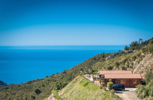 Idyllic wooden houses with breathtaking sea views.