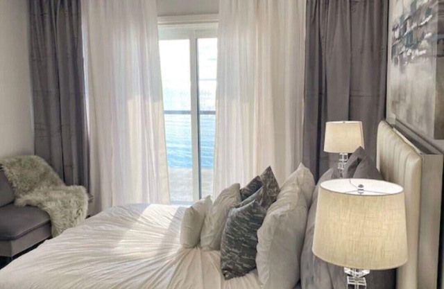 IN THE MOMENT Luxury Beachfront Paradise, with private beach access, BBQ, AC