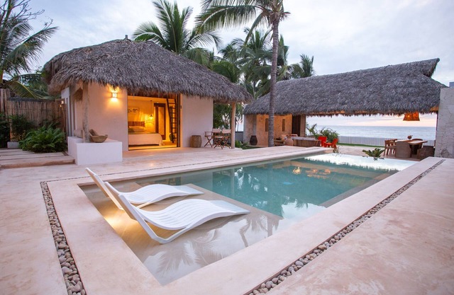 In the Sand Luxury Beach Front Villa w/climate-controlled Saltwater pool