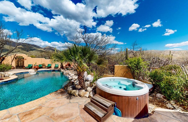 Incredible mountain view dog-friendly home with pool, full kitchen, grill, & TV