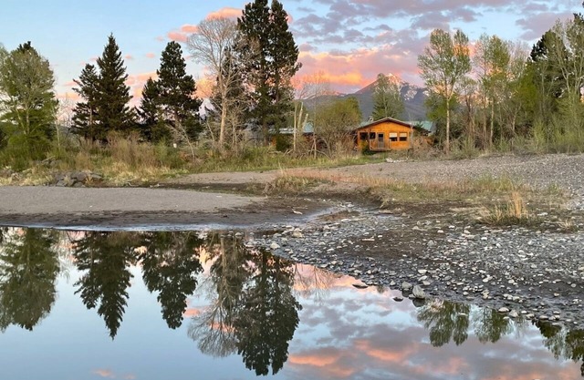 Island House on Yellowstone River with beach and fishing out back door:
