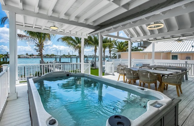 Island Waterfront Retreat with Pool near Beach